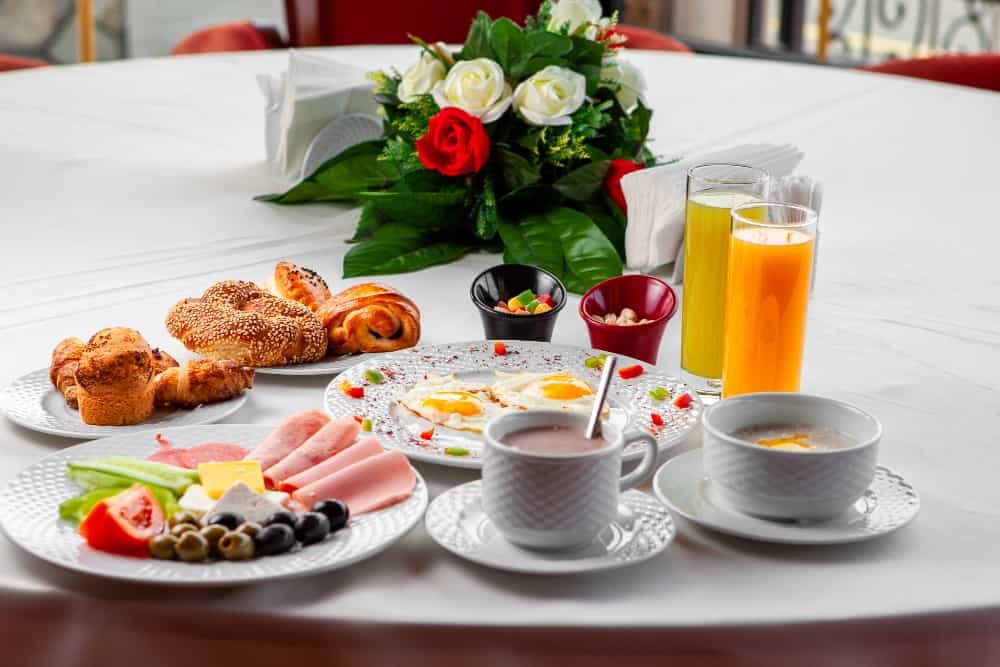 healthy protein breakfast with eggs yogurt and fruits