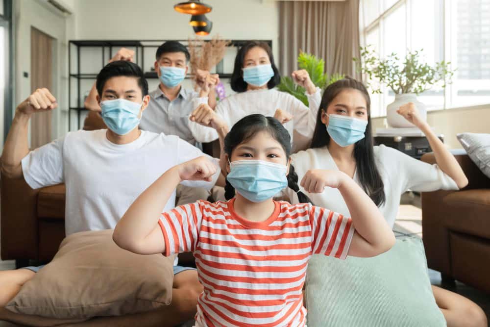Family wearing masks during a viral outbreak
