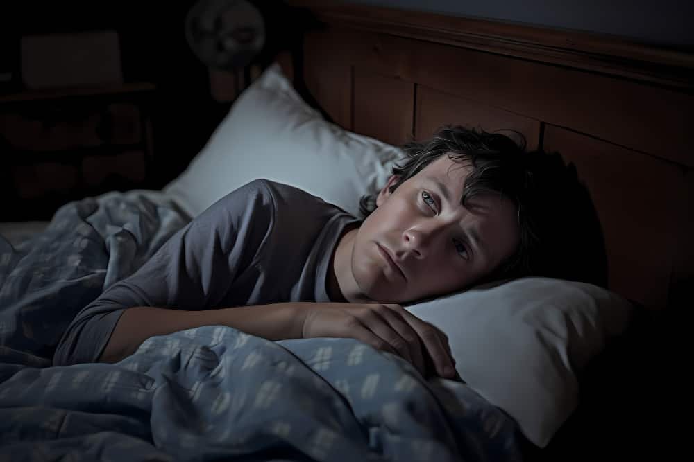 Person sleeping but still feeling mentally exhausted