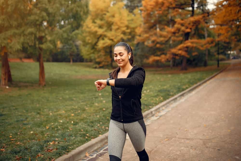 Woman enjoying morning walk for mental health and stress relief