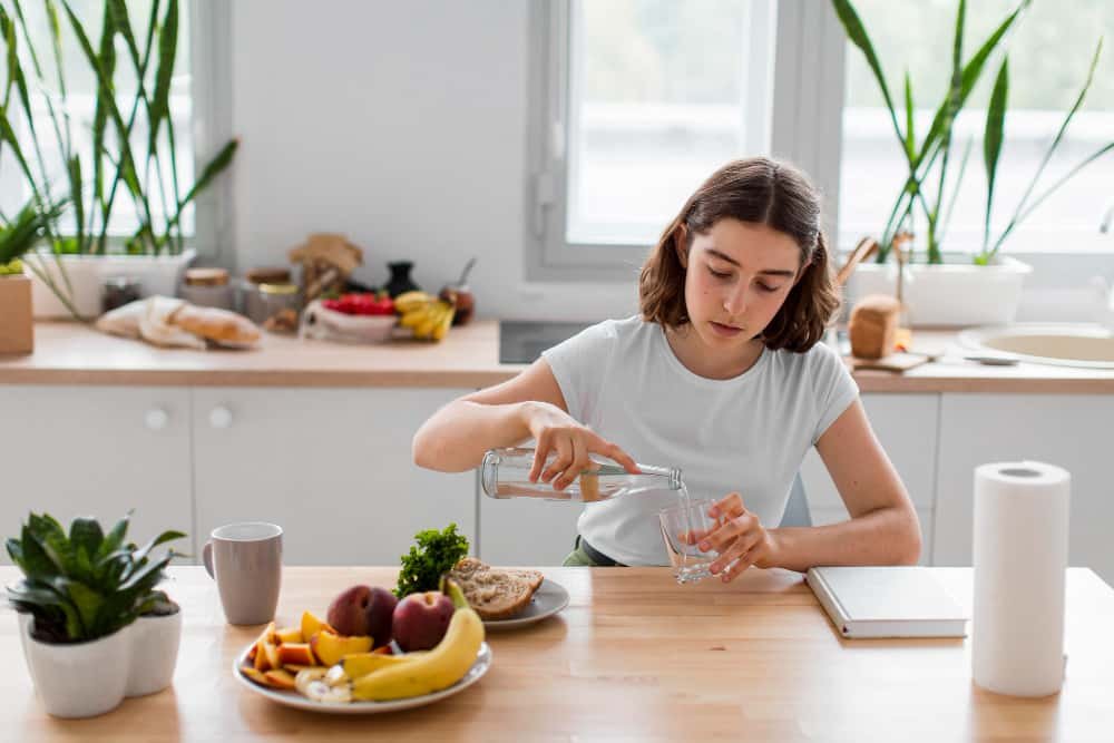 Drinking water to support hydration and healthy eating habits